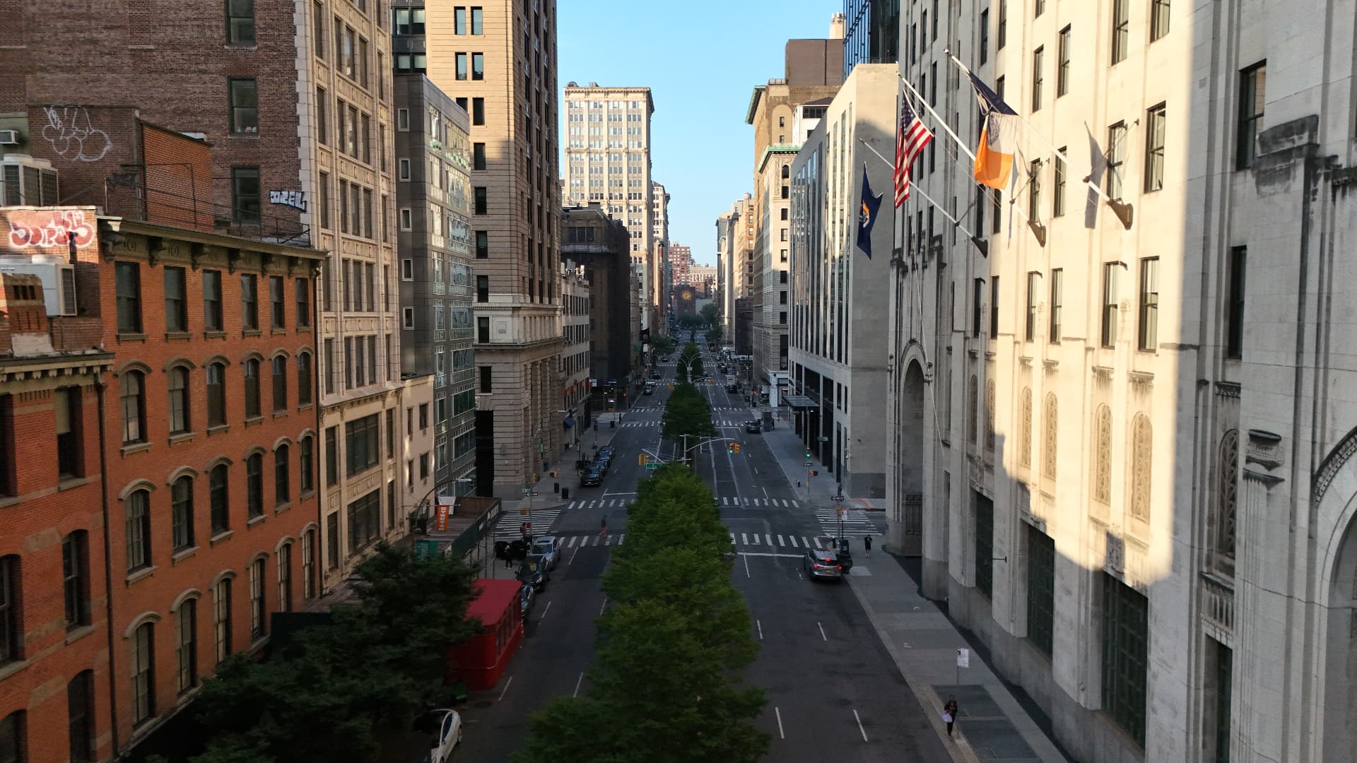 Aerial view of a Manhattan street lined with buildings